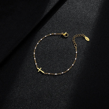 Hemels Kruis Armband in Goudkleurige Roestvrij Staal - Spirituele Elegantie